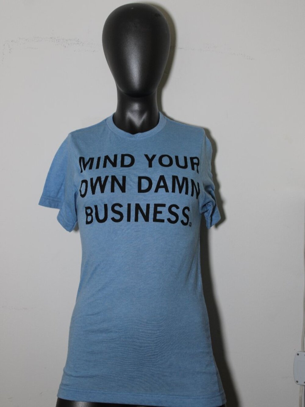 Raygun athletic blue t-shirt "MIND YOUR OWN DAMN BUSINESS."